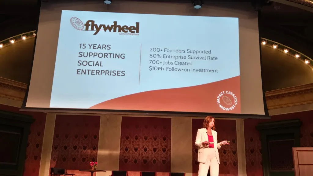 Donna Zaring, Executive Director of Flywheel Social Enterprise Hub, on stage at Impact Catalyst Midwest